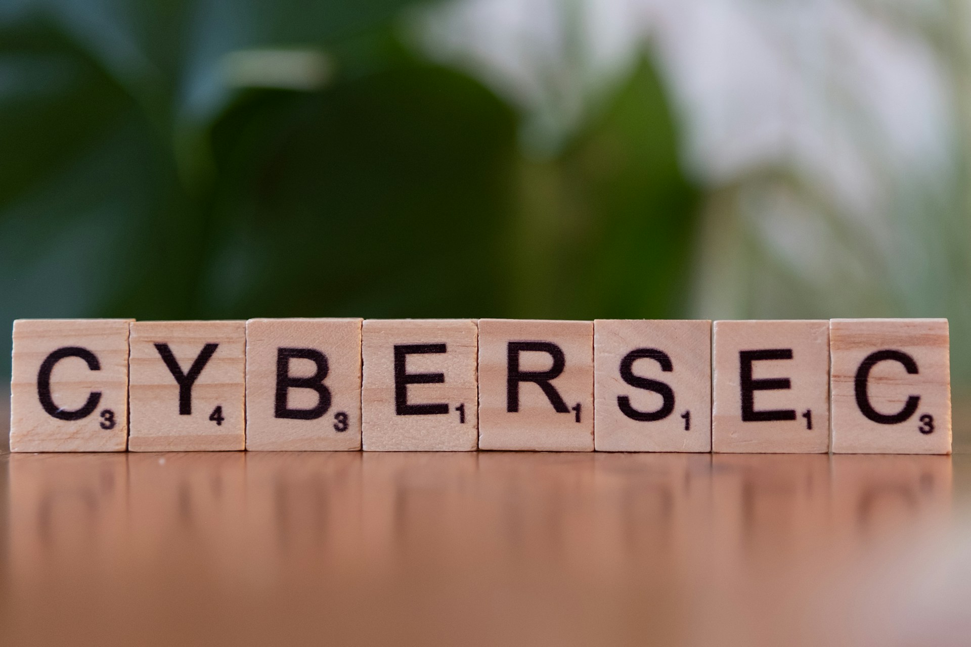 Wooden blocks spelling cybersec on a table